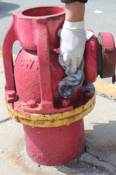 Remove Graffiti From a Painted Metal Fire Hydrant